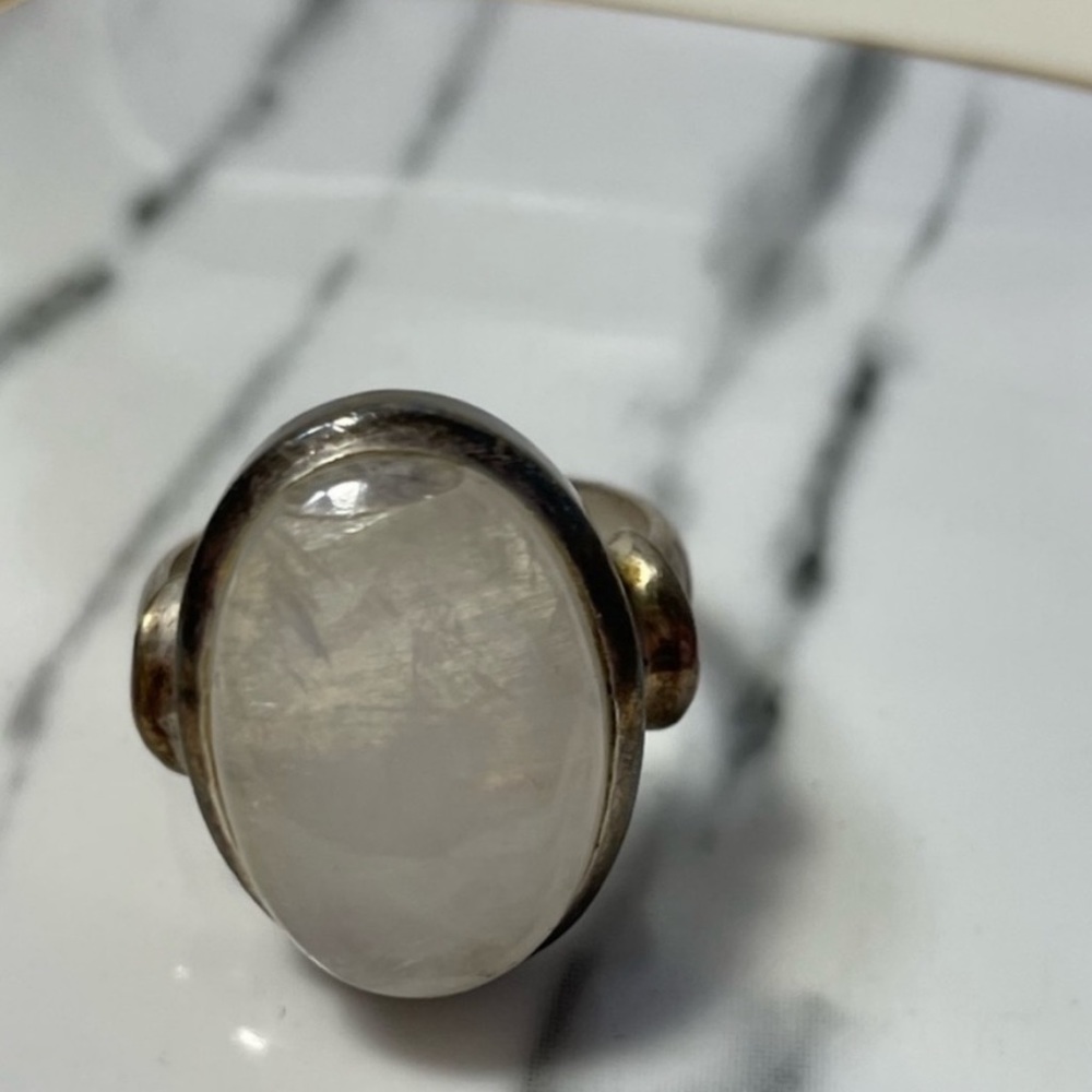 Authentic, rare real Moonstone, placed into a
sterling silver ring. Size 9-10W